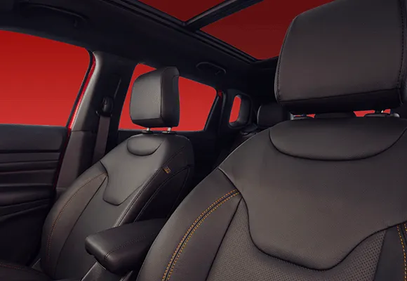 Commanding Black Leatherette Seats with Mayan gold stitching